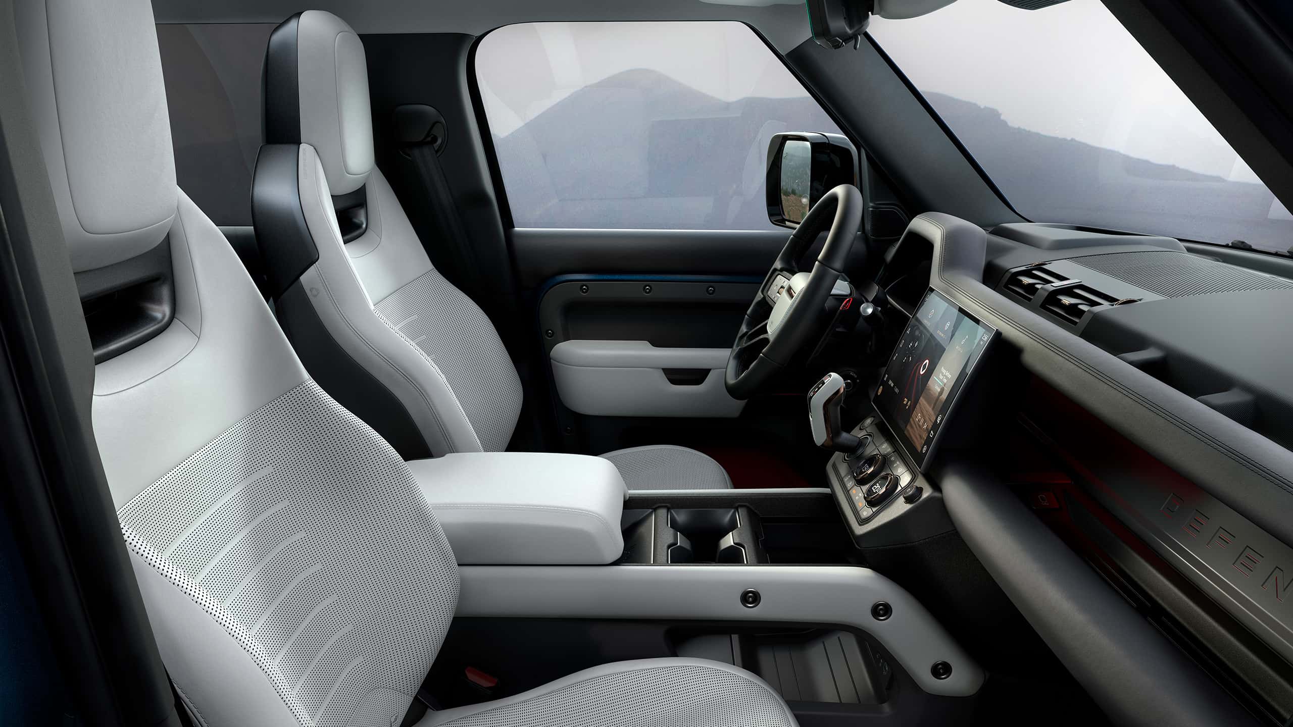 Defender interior side view of seat 
